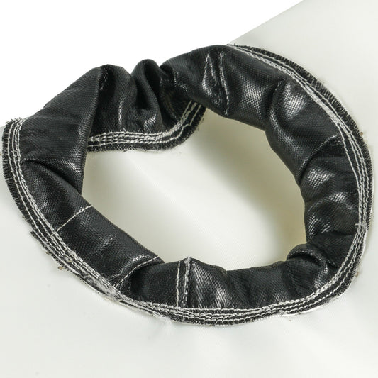 Close-up of a dust filter bag mouth showing black reinforcement, multiple stitch lines and seam construction